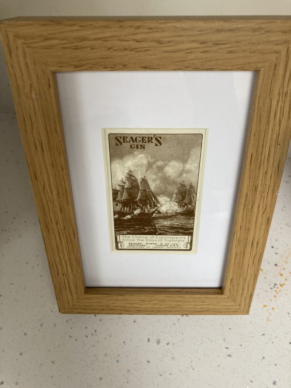 wooden frame showing vintage Seagars Gin